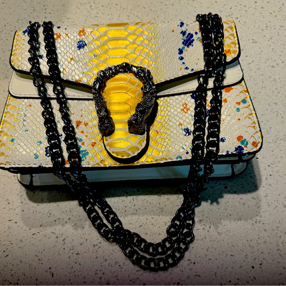 Women snake skin leather purse.
